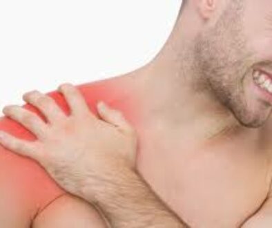 Man holding Shoulder in pain