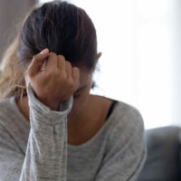 Depressed upset woman feeling hurt sad stressed troubled with problem