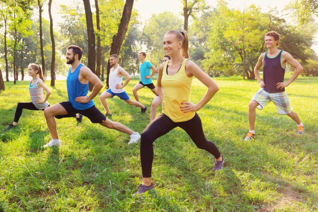 Group of youths exercising in the park