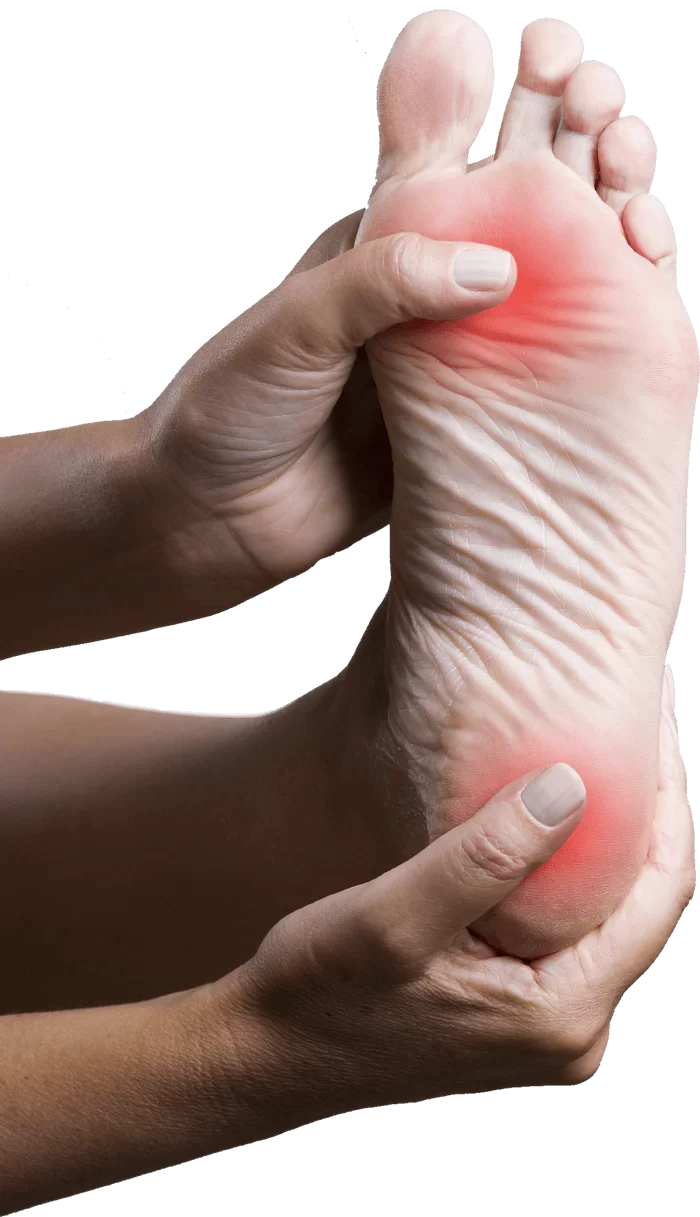 Person grasping pain points on foot