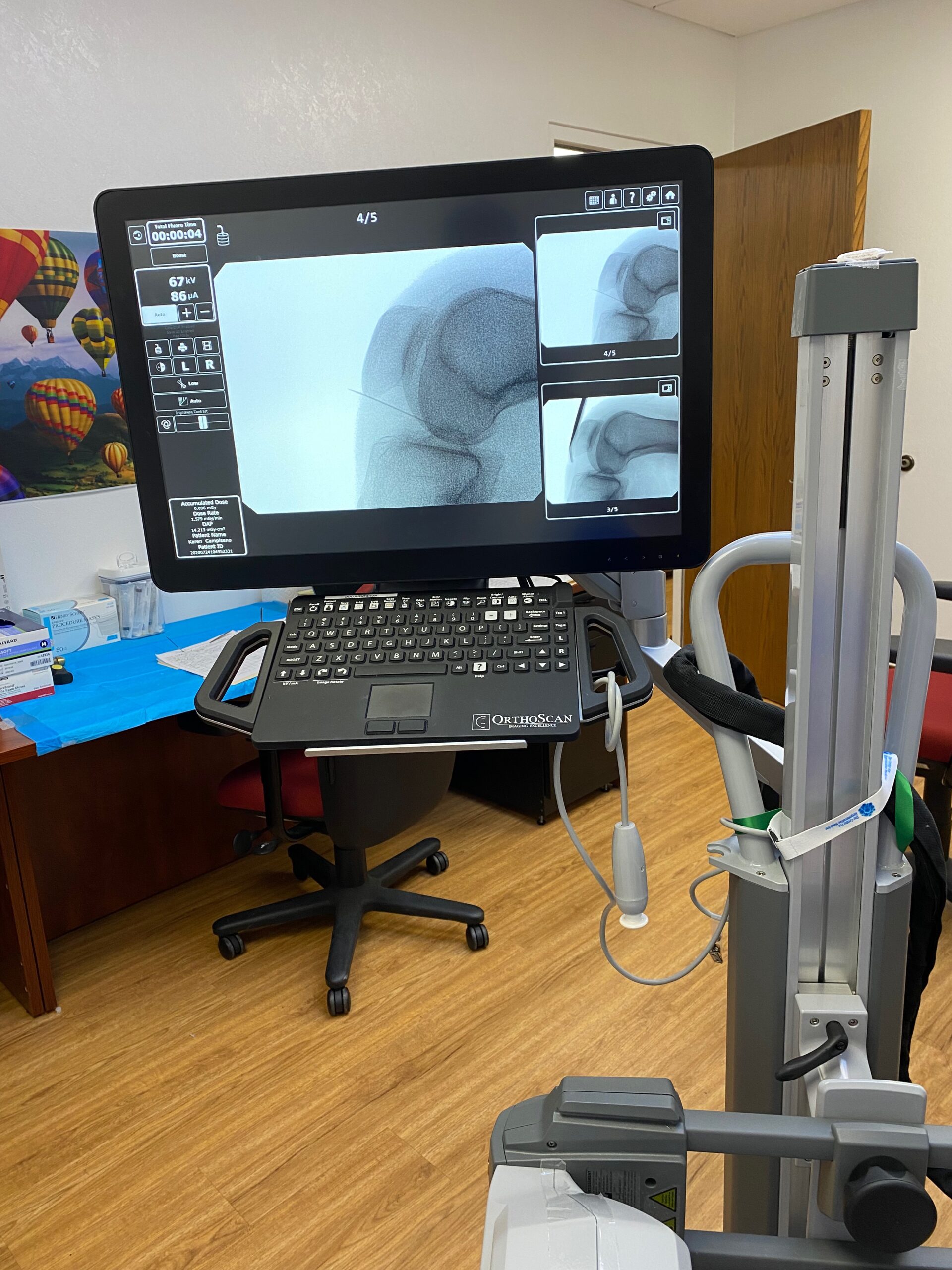 Injecting a patient at Kentuckiana Integrative Medicine Local Louisville Jeffersonville Office using the Orthoscan Machine