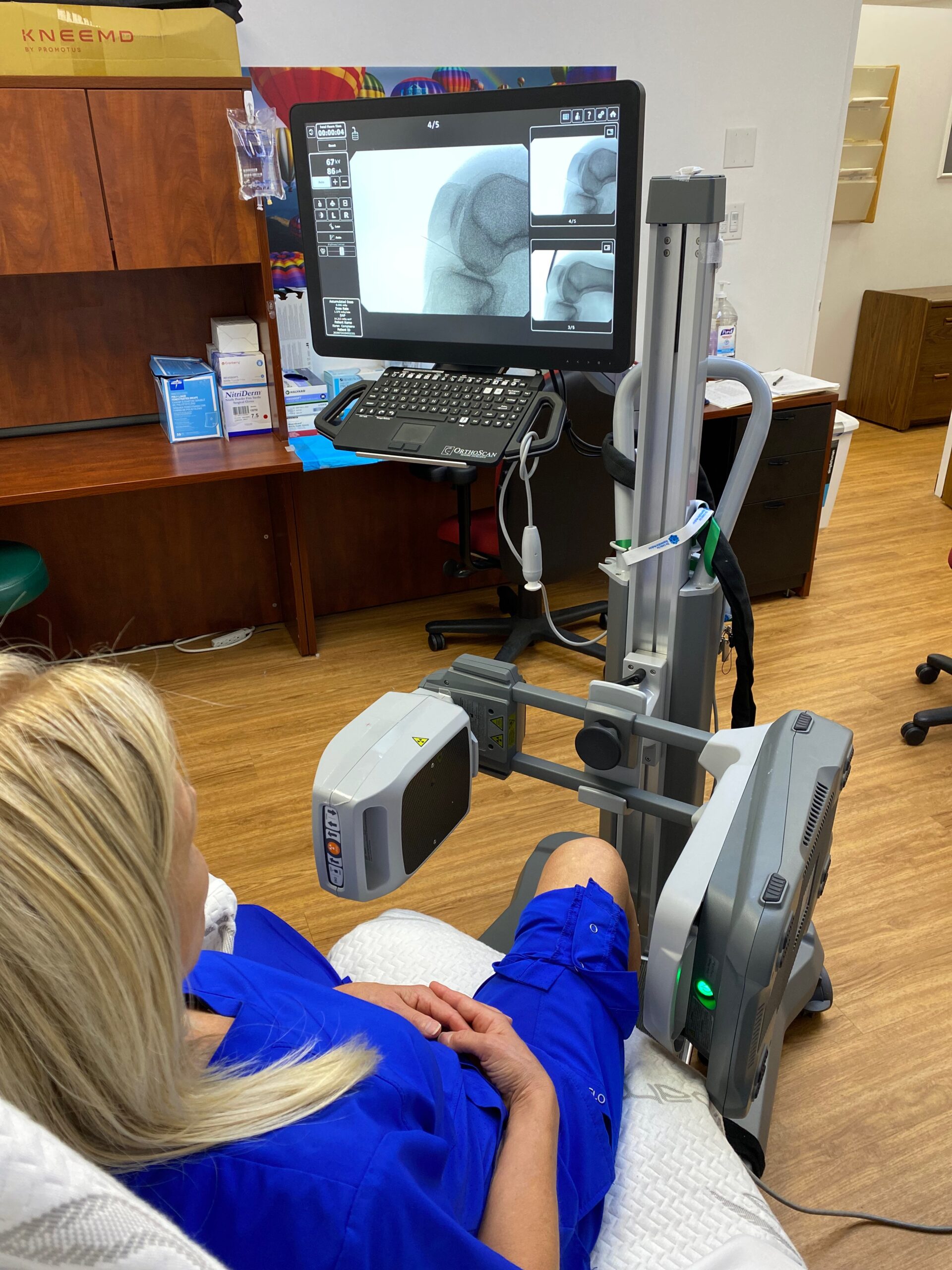 Patient receiving Orthoscan at Kentuckiana Integrative Medicine Local Louisville Jeffersonville Office